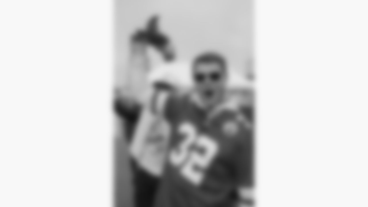 A Kansas City Chiefs fan in the parking lots at GEHA Field at Arrowhead Stadium prior to a week 12 NFL football game against the Indianapolis Colts, Sunday, November 23, 2025 in Kansas City, MO.