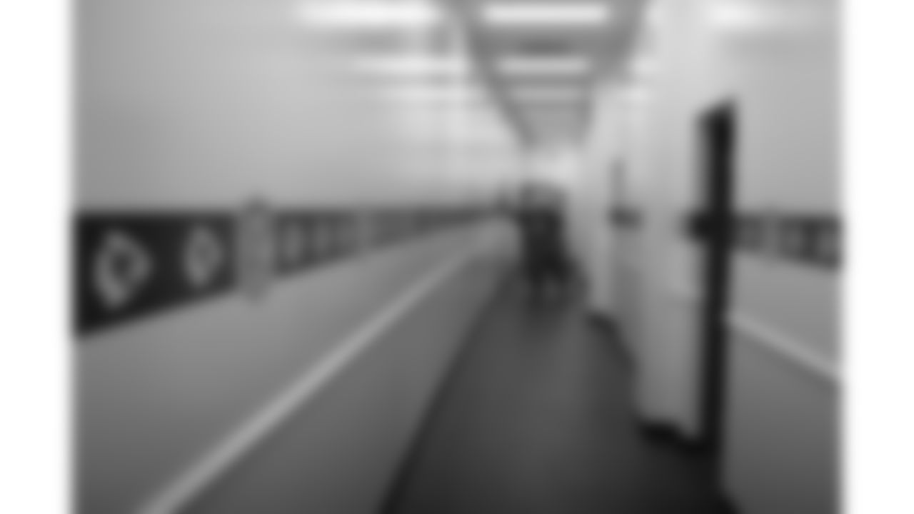 KC Wolf stands in the hallway at Arrowhead Stadium in 2006.