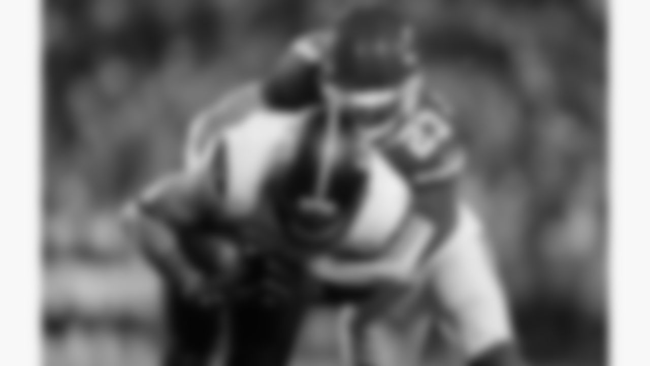 Kansas City Chiefs middle linebacker Drue Tranquill (23) tackles a Washington Commanders receiver during a week 8 NFL Football game against the Washington Commanders on Monday, October 27, 2025 in Kansas City, MO.