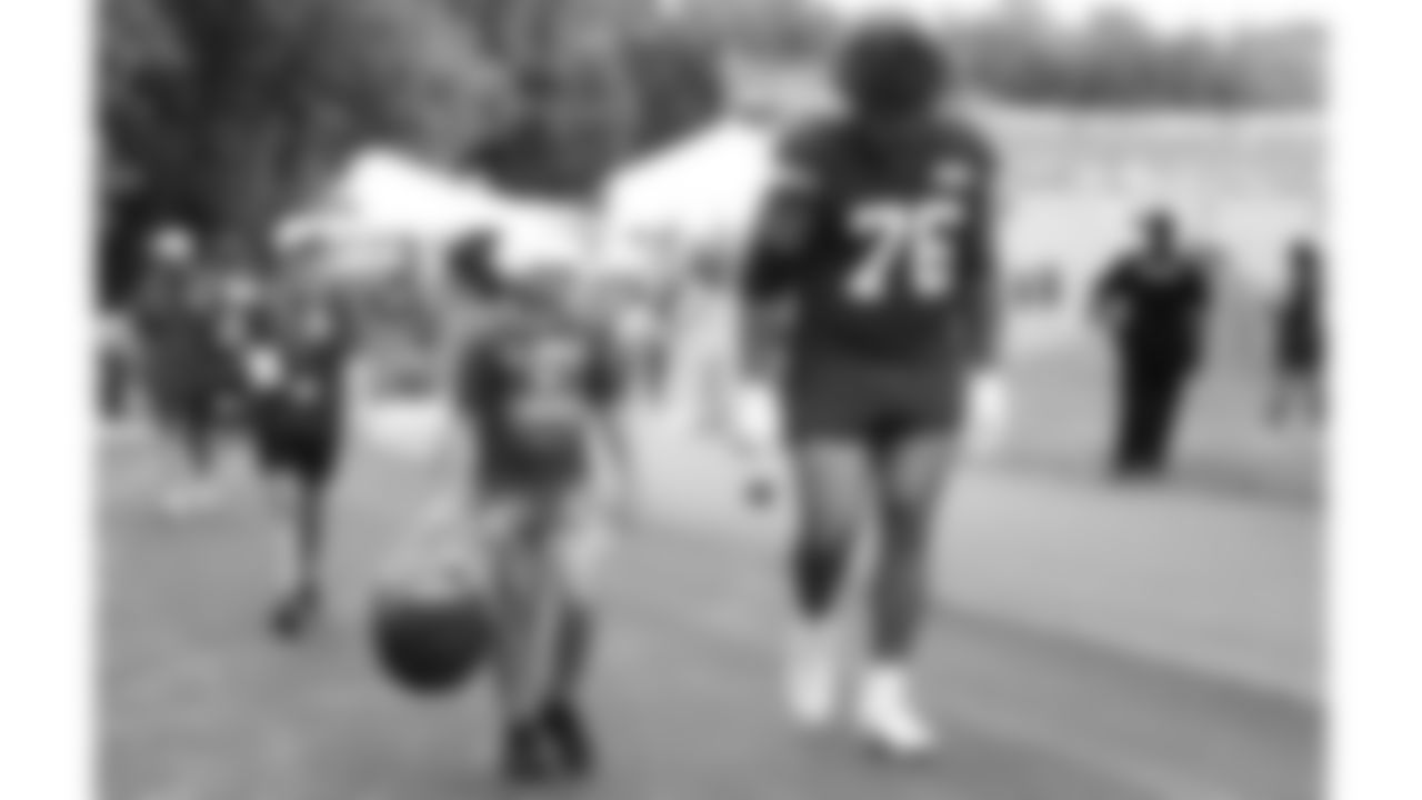 Kansas City Chiefs tackle Kingsley Suamataia (76) during the helmet walk after training camp on day 3 of practice Thursday, July 24, 2025.