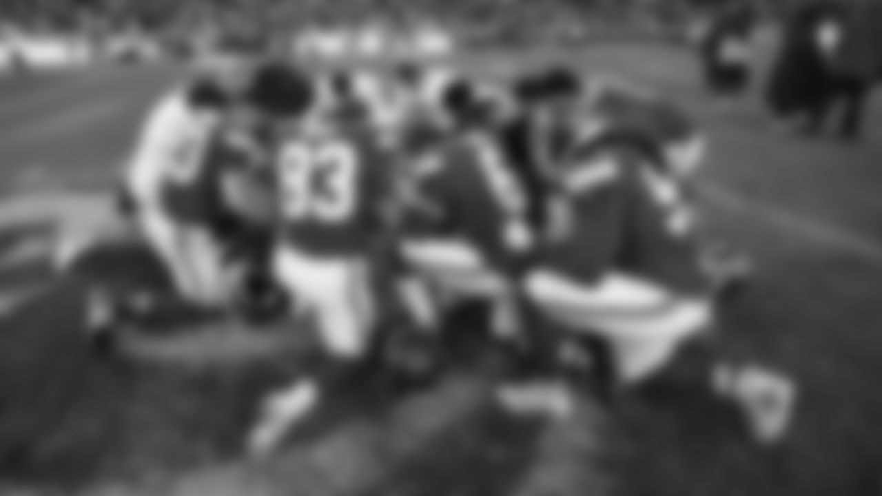 Kansas City Chiefs and the San Diego Chargers pray midfield after an NFL week 15 matchup against the Los Angeles Chargers, Sunday December 14, 2025.