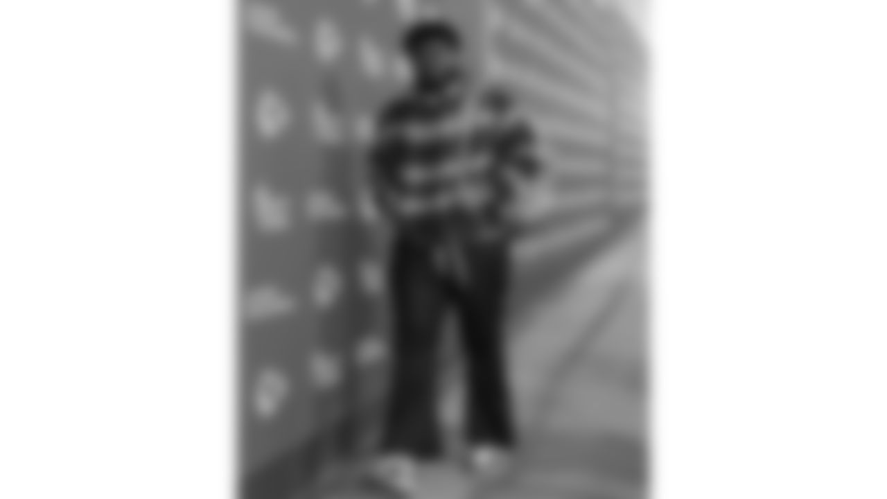 Kansas City Chiefs offensive lineman Jaylon Moore (77) arrives prior to an NFL week 15 matchup against the Los Angeles Chargers, Sunday December 14, 2025.