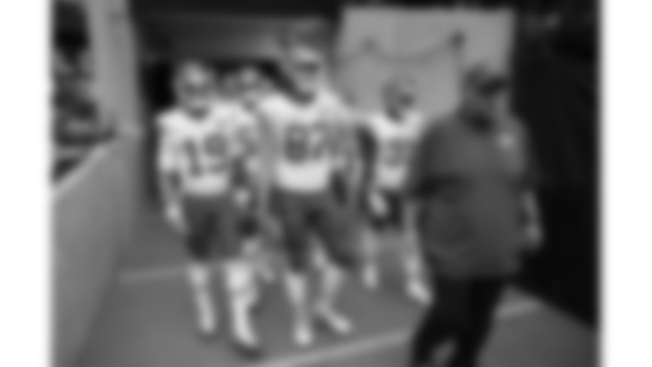 Kansas City Chiefs Head Coach Andy Reid, quarterback Chris Oladokun (19), tight end Travis Kelce (87) and linebacker Jeffrey Bassa (31) enter the field prior to a week 18 game against the Las Vegas Raiders on Sunday, January 3, 2026.