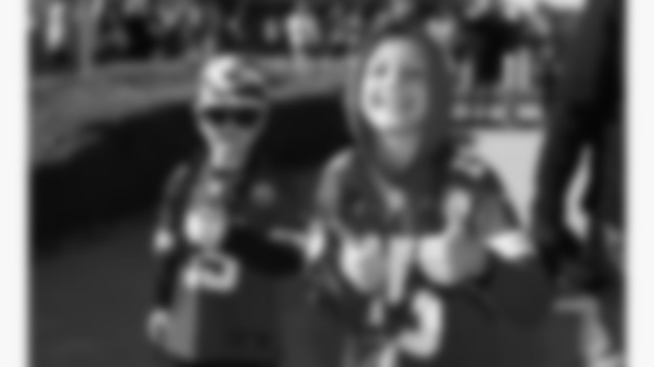 Young fans pose prior to a week 7 NFL football game between the Kansas City Chiefs and the Las Vegas Raiders, Sunday, October 19, 2025 in Kansas City, MO.