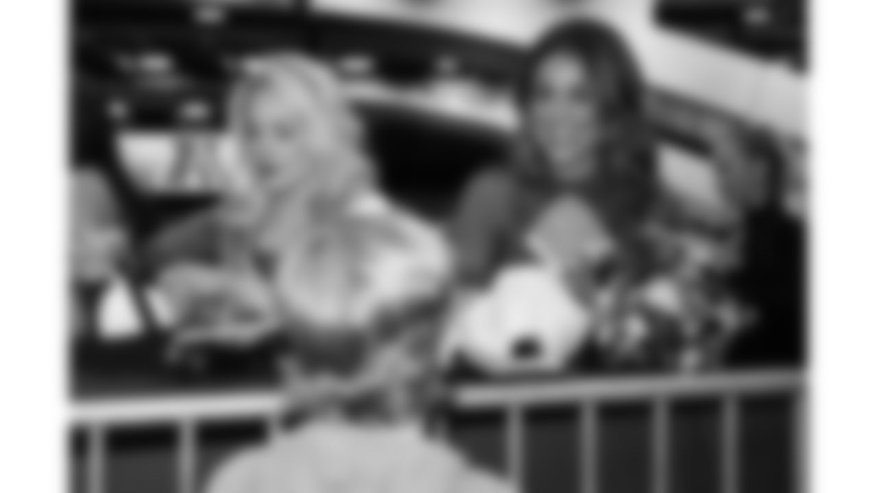 Kansas City Chiefs Cheerleader Sadie signs fan merchandise at the 2026 Pro Bowl opening night at the Moscone Center in San Francisco, California on Monday, February 2, 2026.