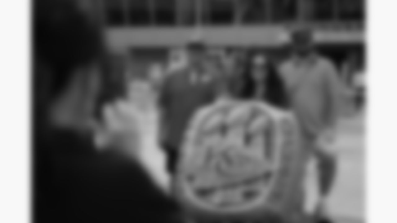 Kansas City Chiefs fans pose with one of the giant Super Bowl rings prior to a week 2 NFL football game against the Philadelphia Eagles, Sunday, September 14, 2025 in Kansas City, MO.