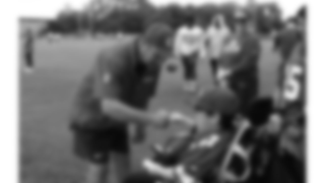 Josh "Turbo" Pham, a child battling an aggressive disease, visits practice during phase 3 of OTAs on Friday, June 13, 2025 in Kansas City, MO.