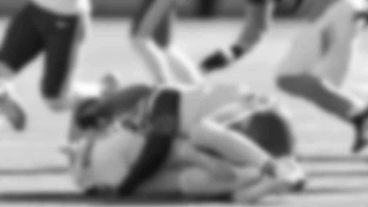 Kansas City Chiefs defensive back Jaden Hicks (21) makes a tackle during a week 16 NFL Football game against the Tennessee Titans on Sunday, December 21, 2025 in Nashville, Tennessee.