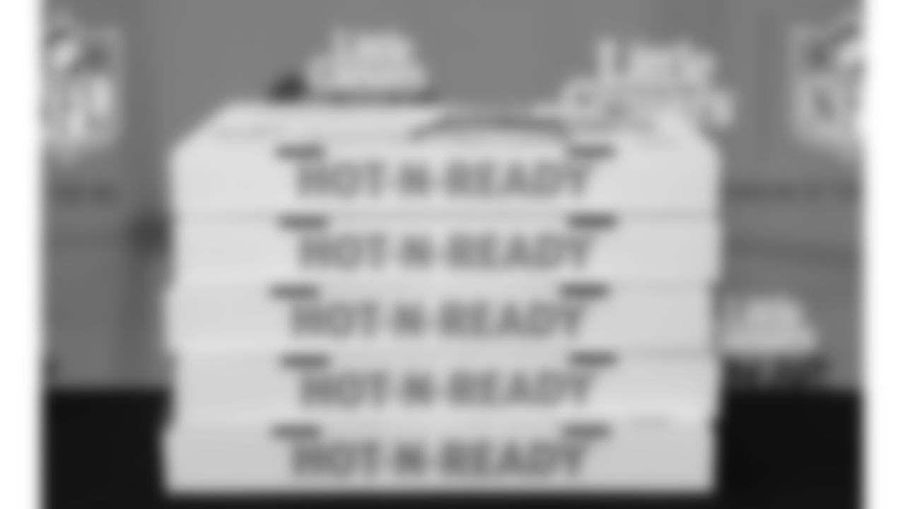 Kansas City Chiefs representatives and the Little Caesars Love Kitchen provide pizza for local U.S. service members and their families at Life.Church Faith & Family Chapel on Tuesday, September 23, 2025 in Kansas City, MO.