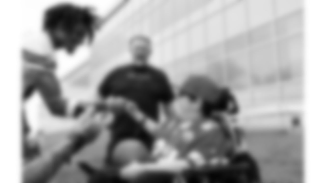 Josh "Turbo" Pham, a child battling an aggressive disease, visits practice during phase 3 of OTAs on Friday, June 13, 2025 in Kansas City, MO.