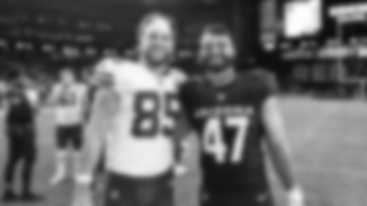 Kansas City Chiefs tight end Robert Tonyan (85) and Arizona Cardinals tight end Josiah Deguara (47) following a preseason week 1 NFL football game, Saturday, August 9, 2025 in Glendale, AZ.