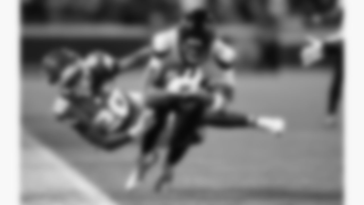 Kansas City Chiefs defensive back Nohl Williams (20) dives at Houston Texans quarterback C.J. Stroud (7) during a week 14 NFL football game, Sunday, December 7, 2025 in Kansas City, MO.