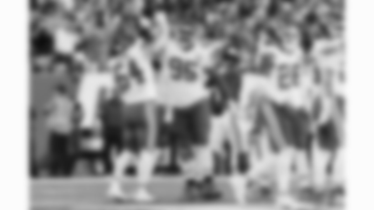 Kansas City Chiefs linebacker Leo Chenal (54) and defensive tackle Chris Jones (95) celebrate a sack during the week 3 NFL football game against the New York Giants, Sunday, September 21, 2025 in East Rutherford, NJ.