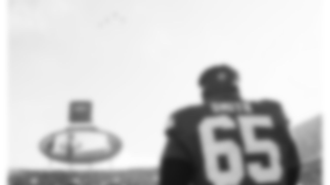 Kansas City Chiefs guard Trey Smith (65) watches the flyover during the National Anthem prior to a week 12 NFL football game against the Indianapolis Colts, Sunday, November 23, 2025 in Kansas City, MO.