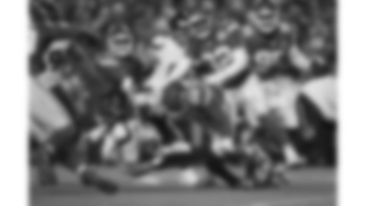 Kansas City Chiefs defensive end George Karlaftis (56) sacks Houston Texans quarterback C.J. Stroud (7) during a week 14 NFL football game, Sunday, December 7, 2025 in Kansas City, MO.