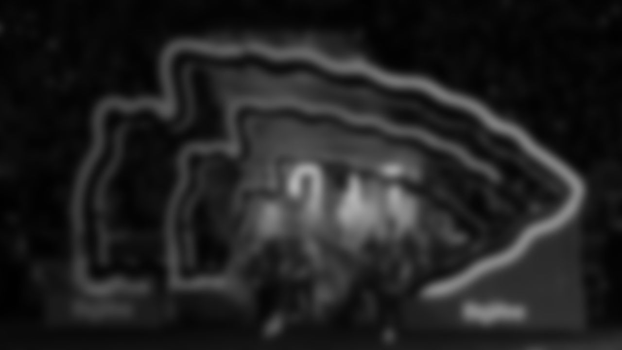 Chiefs Flag Runners enter the field prior to a week 14 NFL Football game against the Houston Texans on Sunday, December 7, 2025 in Kansas City, MO.