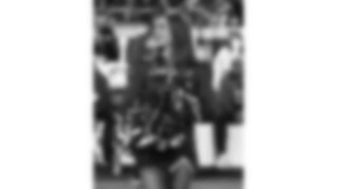 The Kansas City Chiefs Cheerleaders and Entertainment teams prior to a week 17 NFL Football game against the Denver Broncos on December 25, 2025 in Kansas City, MO.