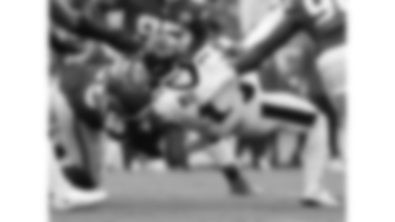 Kansas City Chiefs defensive tackle Omarr Norman-Lott (55) sacks Philadelphia Eagles quarterback Jalen Hurts (1) during the week 2 NFL football game, Sunday, September 14, 2025 in Kansas City, MO.