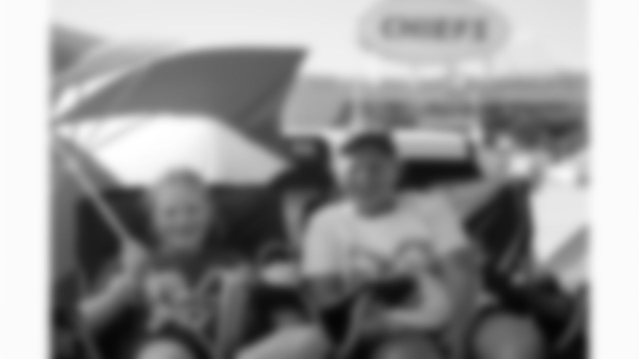 Kansas City Chiefs fans tailgate in the parking lot at GEHA Field at Arrowhead Stadium prior to a preseason week 3 NFL football game against the Chicago Bears, Friday, August 22, 2025 in Kansas City, MO.