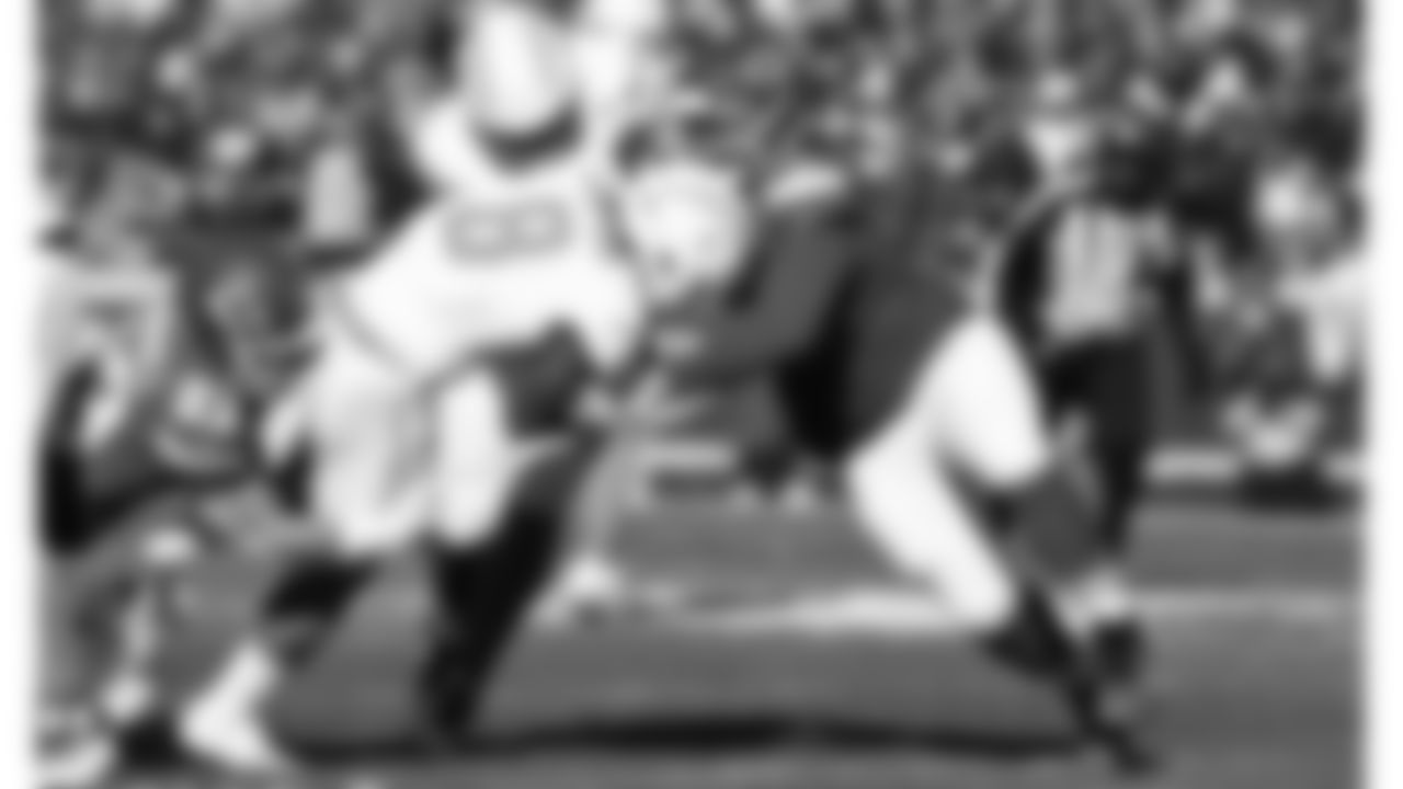 Kansas City Chiefs middle linebacker Drue Tranquill (23) makes a tackle during an NFL week 15 matchup against the Los Angeles Chargers, Sunday December 14, 2025.