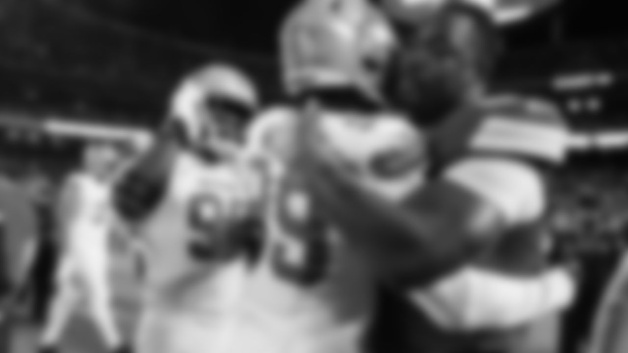 Kansas City Chiefs defensive tackle Chris Jones (95) gives a hug to Detroit Lions defensive edge Tyrus Wheat (99) after a week 6 NFL Football game against the Detroit Lions on Sunday, October 12, 2025 in Kansas City, MO.
