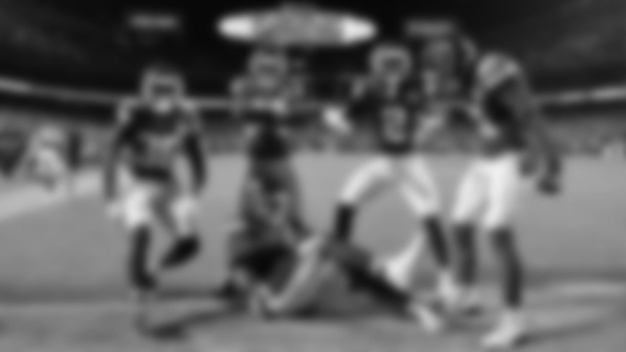 Kansas City Chiefs cornerbacks Jaylen Watson (35), Trent McDuffie (22), Joshua Williams (2) and defensive back Jaden Hicks (21) celebrate an interception by defensive end Mike Danna (51) during a week 8 NFL Football game against the Washington Commanders on Monday, October 27, 2025 in Kansas City, MO.