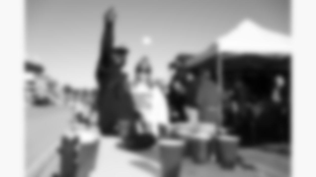 Fans tailgate in the parking lot prior to a week 7 NFL football game between the Kansas City Chiefs and the Las Vegas Raiders, Sunday, October 19, 2025 in Kansas City, MO.