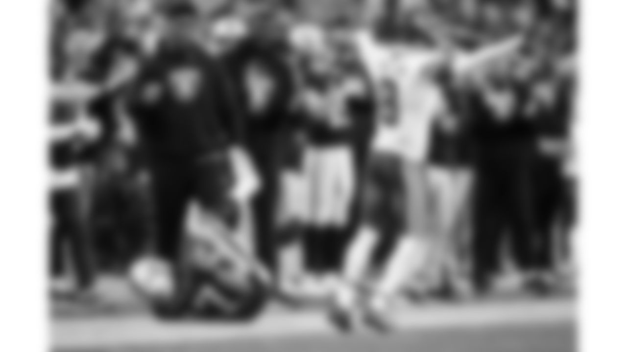 Kansas City Chiefs cornerback Kristian Fulton (8) celebrates over Las Vegas Raiders wide receiver Tyler Lockett (17) during a week 18 NFL football game, Sunday, January 4, 2026 in Las Vegas, NV.