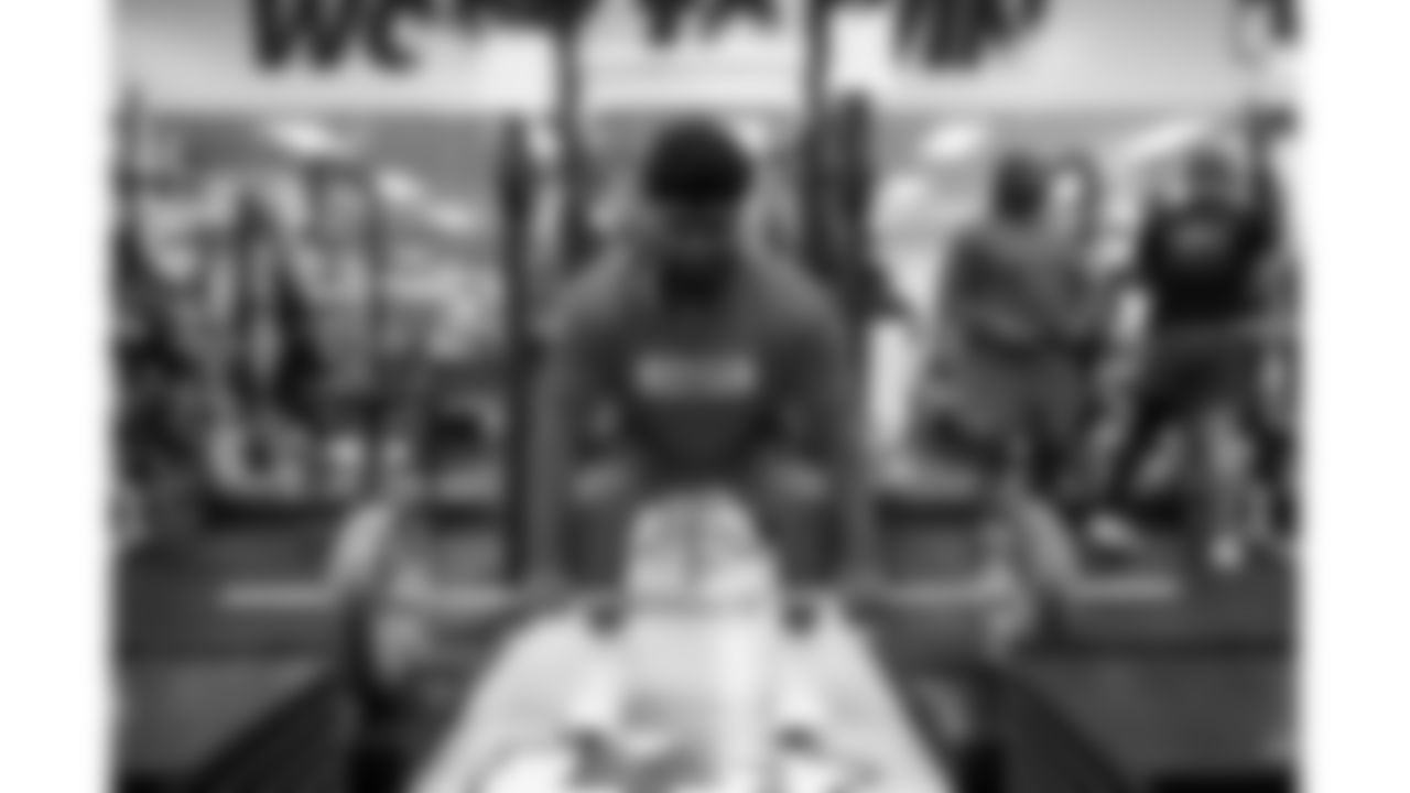 Kansas City Chiefs offensive lineman Jaylon Moore (77) puts in work in the weight room on Thursday, June 5, 2025.