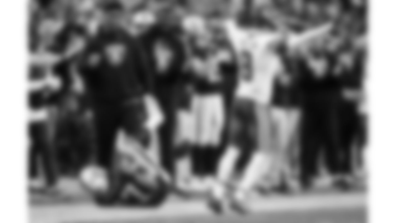 Kansas City Chiefs cornerback Kristian Fulton (8) celebrates over Las Vegas Raiders wide receiver Tyler Lockett (17) during a week 18 NFL football game, Sunday, January 4, 2026 in Las Vegas, NV.