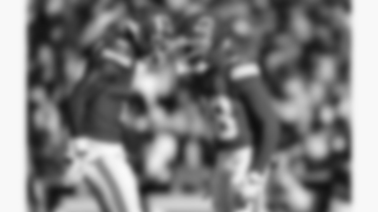 Kansas City Chiefs defensive back Kevin Knowles (38) celebrates with cornerback Joshua Williams (2) during a week 15 NFL football game against the Los Angeles Chargers, Sunday, December 14, 2025 in Kansas City, MO.