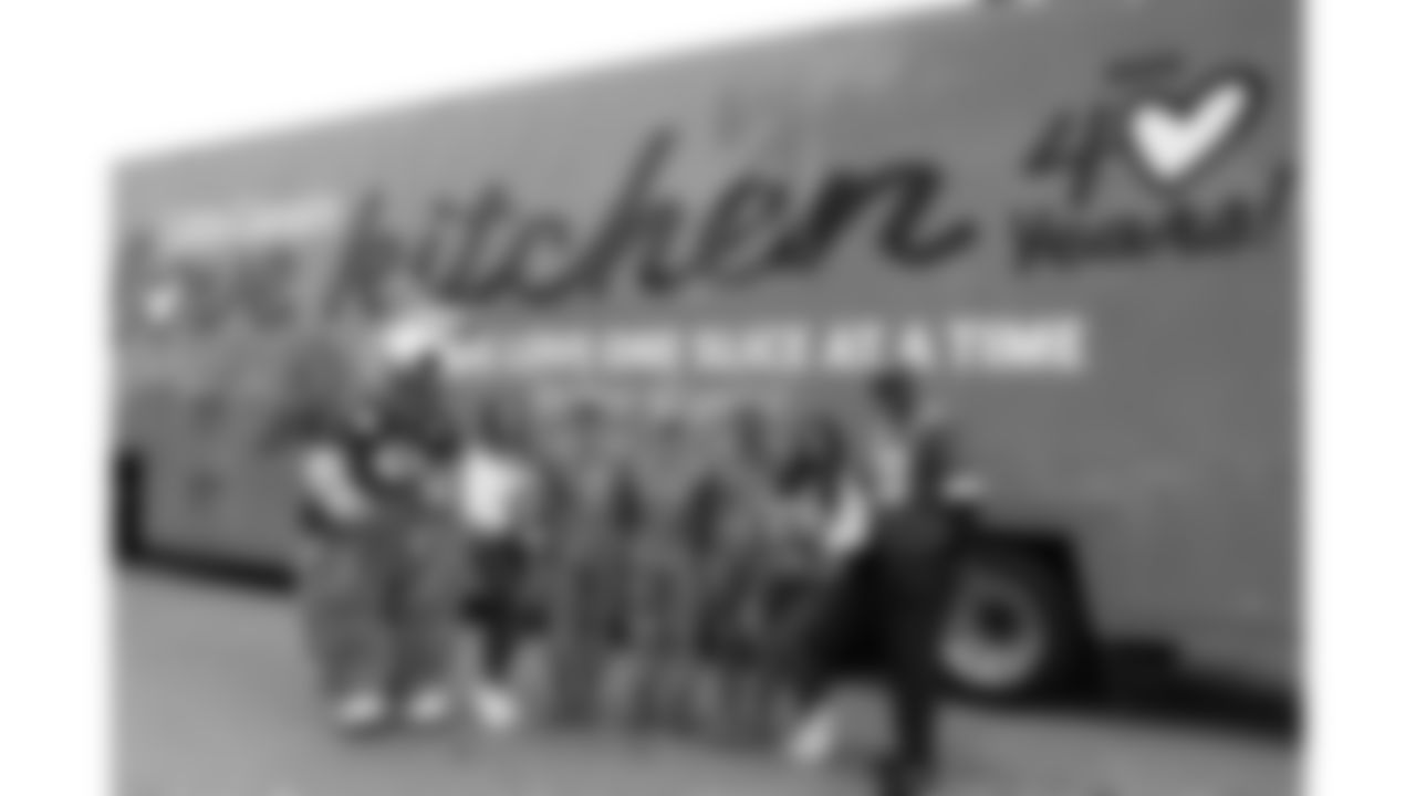 Kansas City Chiefs representatives and the Little Caesars Love Kitchen provide pizza for local U.S. service members and their families at Life.Church Faith & Family Chapel on Tuesday, September 23, 2025 in Kansas City, MO.