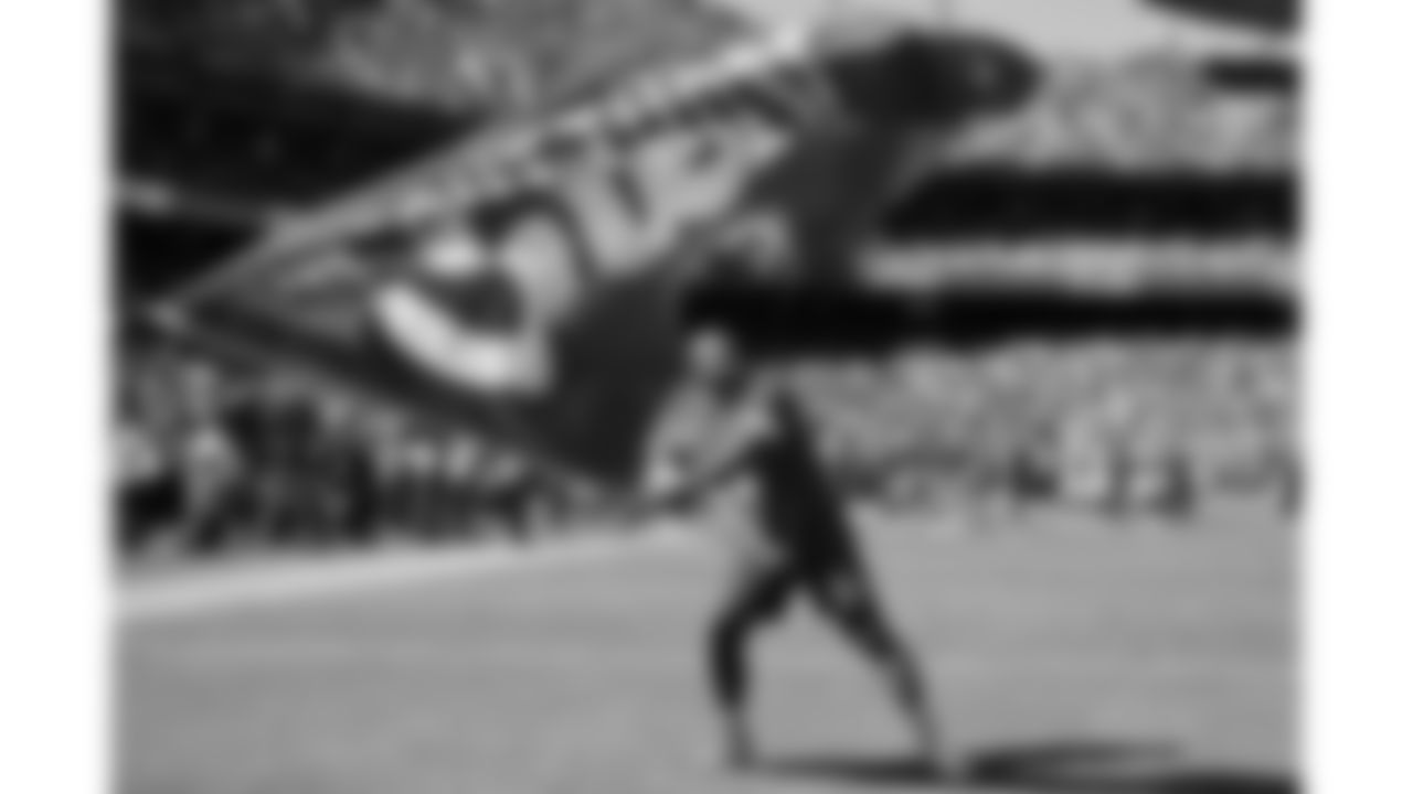 A Chiefs Flag Runner during a week 7 NFL Football game against the Las Vegas Raiders on Sunday, October 19, 2025.