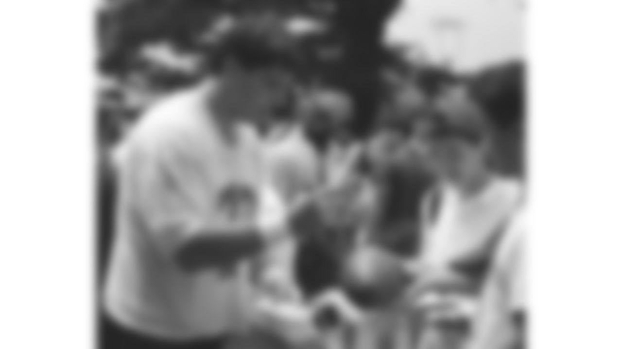 Kansas City Chiefs center Joe Valerio (73) signs autographs in 1994 in Tokyo, Japan.