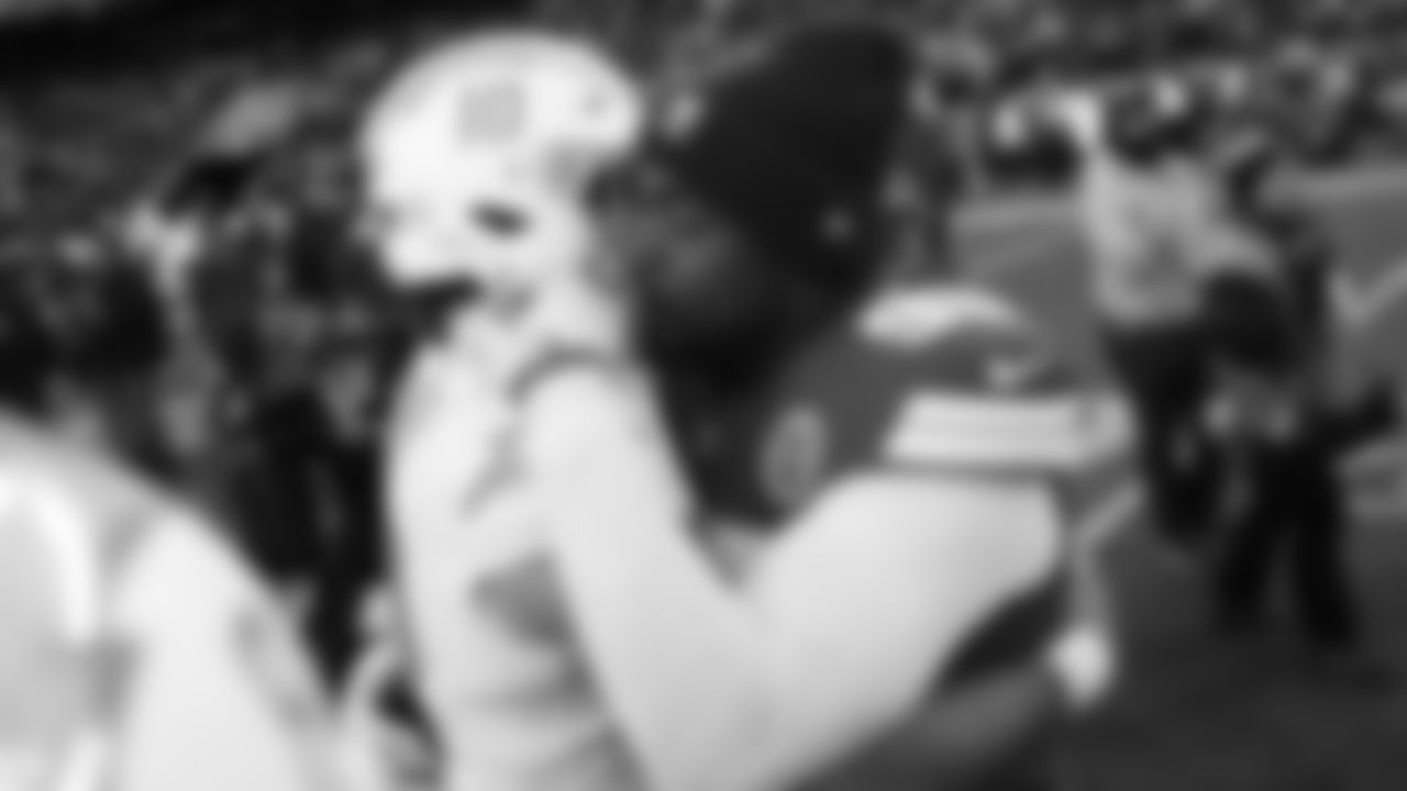 Kansas City Chiefs defensive tackle Chris Jones (95) hugs San Diego Chargers quarterback Justin Herbert (10) after an NFL week 15 matchup against the Los Angeles Chargers, Sunday December 14, 2025.