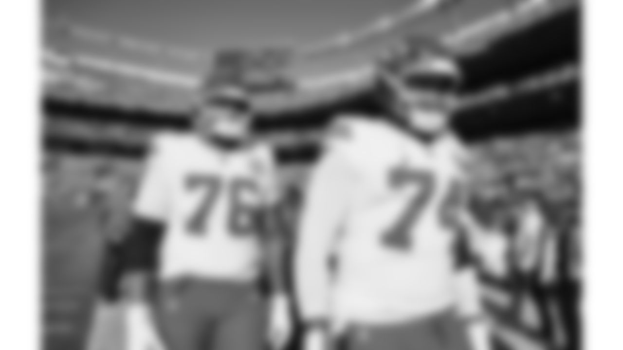 Kansas City Chiefs tackles Kingsley Suamataia (76) and Jawaan Taylor (74) on the field prior to a week 11 NFL Football game against the Denver Broncos on Sunday, November 16, 2025 in Denver, Colorado.