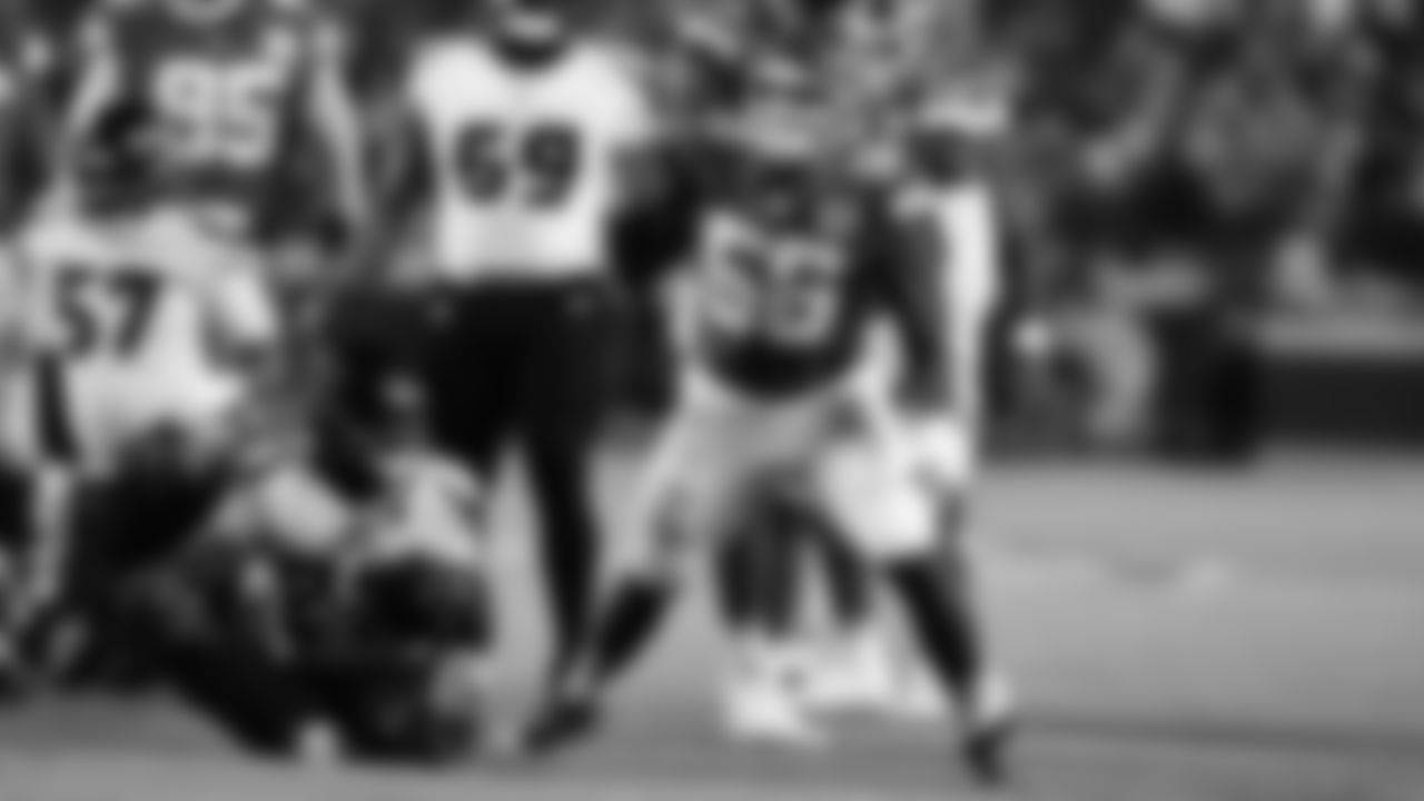 Kansas City Chiefs defensive end George Karlaftis (56) celebrates a tackle during an NFL week 14 matchup against the Houston Texans, Sunday December 7, 2025.