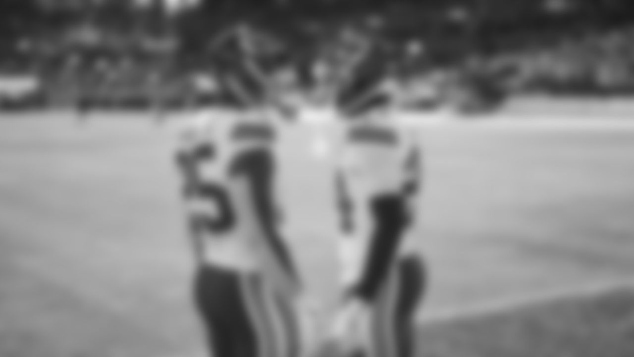 Kansas City Chiefs running backs Elijah Mitchell (25) and Brashard Smith (24) warm up prior to a week 11 NFL Football game against the Denver Broncos on Sunday, November 16, 2025 in Denver, Colorado.