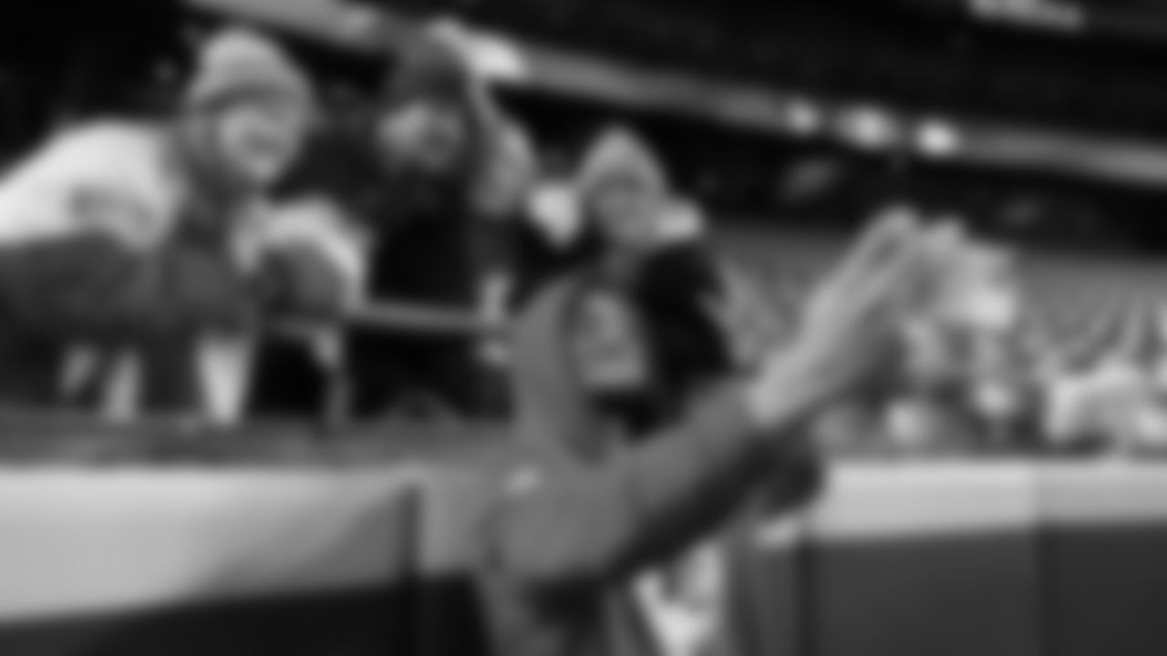 Kansas City Chiefs safety Bryan Cook (6) and fans prior to an NFL week 14 matchup against the Houston Texans, Sunday December 7, 2025.