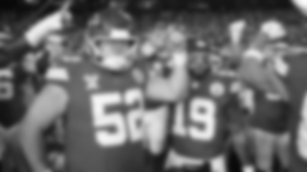 Center Creed Humphrey (52), and Kansas City Chiefs quarterback Chris Oladokun (19) on the field prior to an NFL week 17 matchup against the Denver Broncos, Thursday, December 25, 2025.