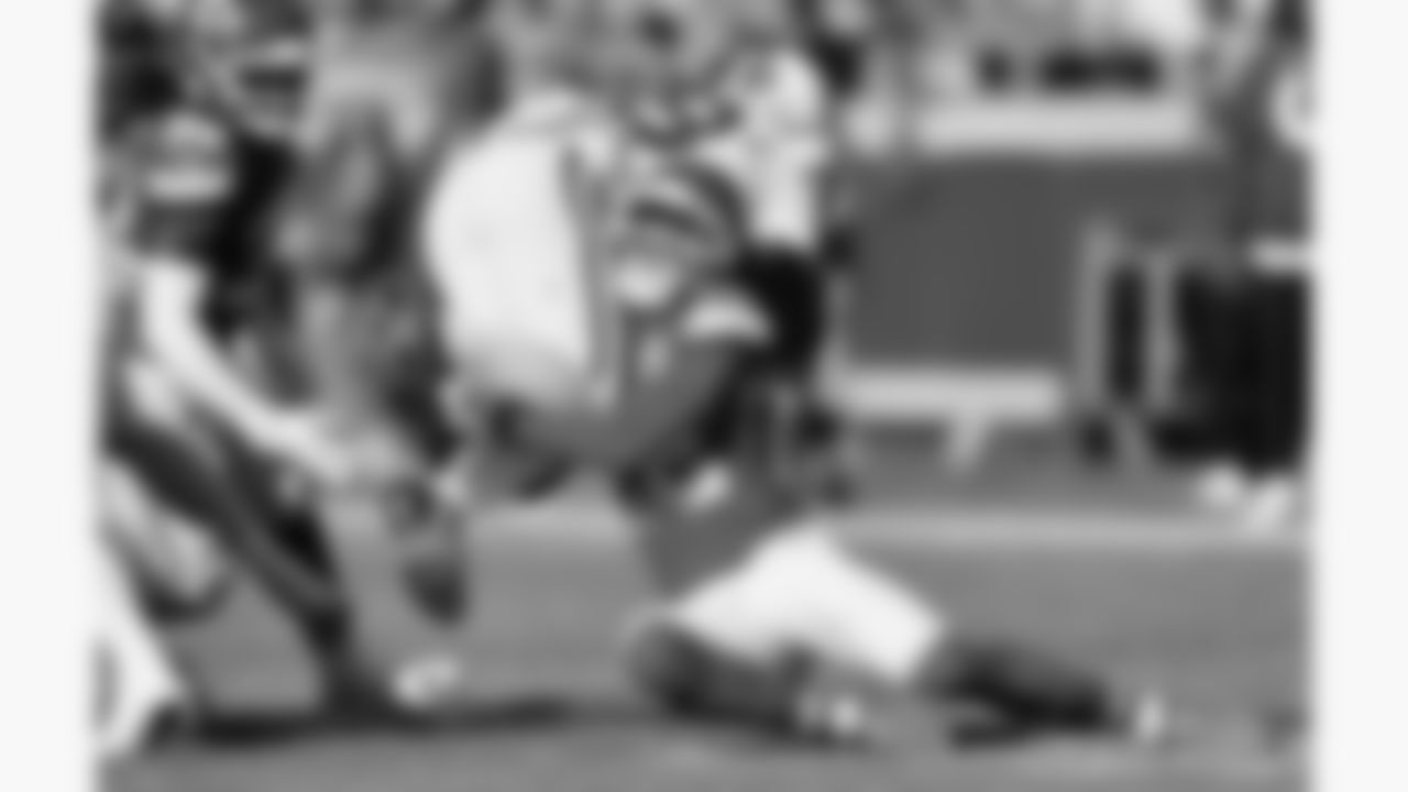 Kansas City Chiefs cornerback Trent McDuffie (22) tackles Indianapolis Colts running back Jonathan Taylor (28) during a week 12 NFL football game, Sunday, November 23, 2025 in Kansas City, MO.