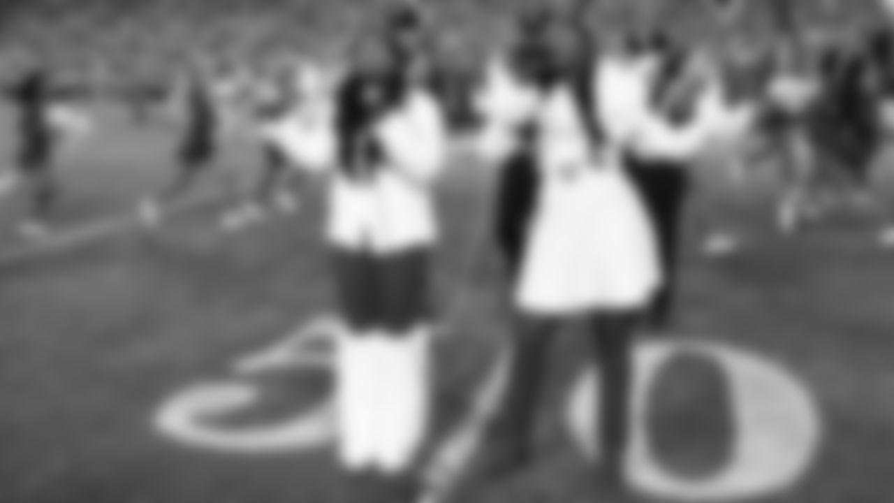 Brianna Yancey and Mikaela Ayira sing the National Anthem prior to an NFL week 17 matchup against the Denver Broncos, Thursday, December 25, 2025.