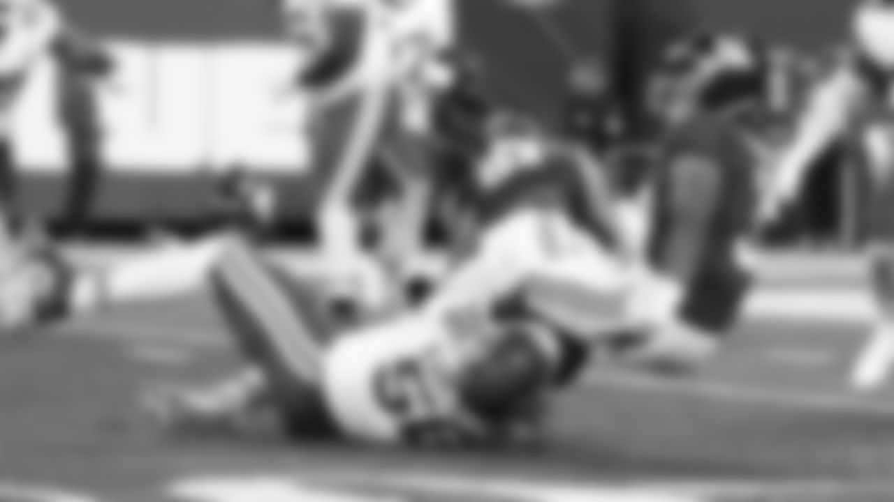 Kansas City Chiefs defensive end George Karlaftis (56) sacks New York Giants quarterback Russell Wilson (3) during the week 3 NFL football game, Sunday, September 21, 2025 in East Rutherford, NJ.