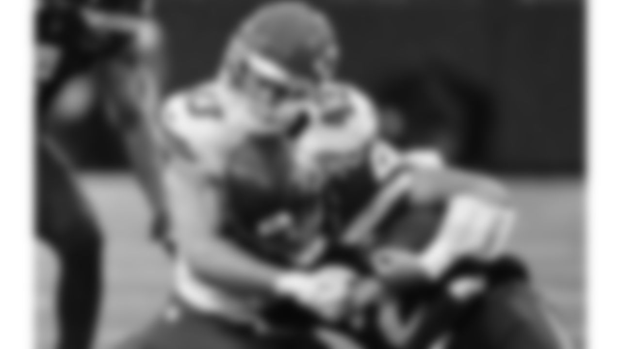 Kansas City Chiefs linebacker Jack Cochrane (43) tackles Seattle Seahawks quarterback Drew Lock (2) during a preseason week 2 NFL football game, Friday, August 15, 2025 in Seattle, WA.