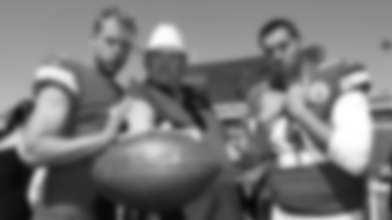 Kansas City Chiefs punter Dustin Colquitt (2) and long snapper James Winchester (41) pose with actor David Koechner before the NFL football game against the Los Angeles Chargers in Carson, Sunday, Sept. 24, 2017.