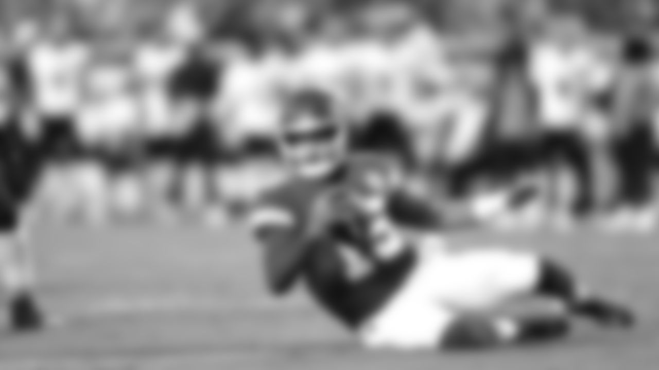 Kansas City Chiefs quarterback Patrick Mahomes (15) slides during a preseason week 3 NFL football game against the Chicago Bears, Friday, August 22, 2025 in Kansas City, MO.