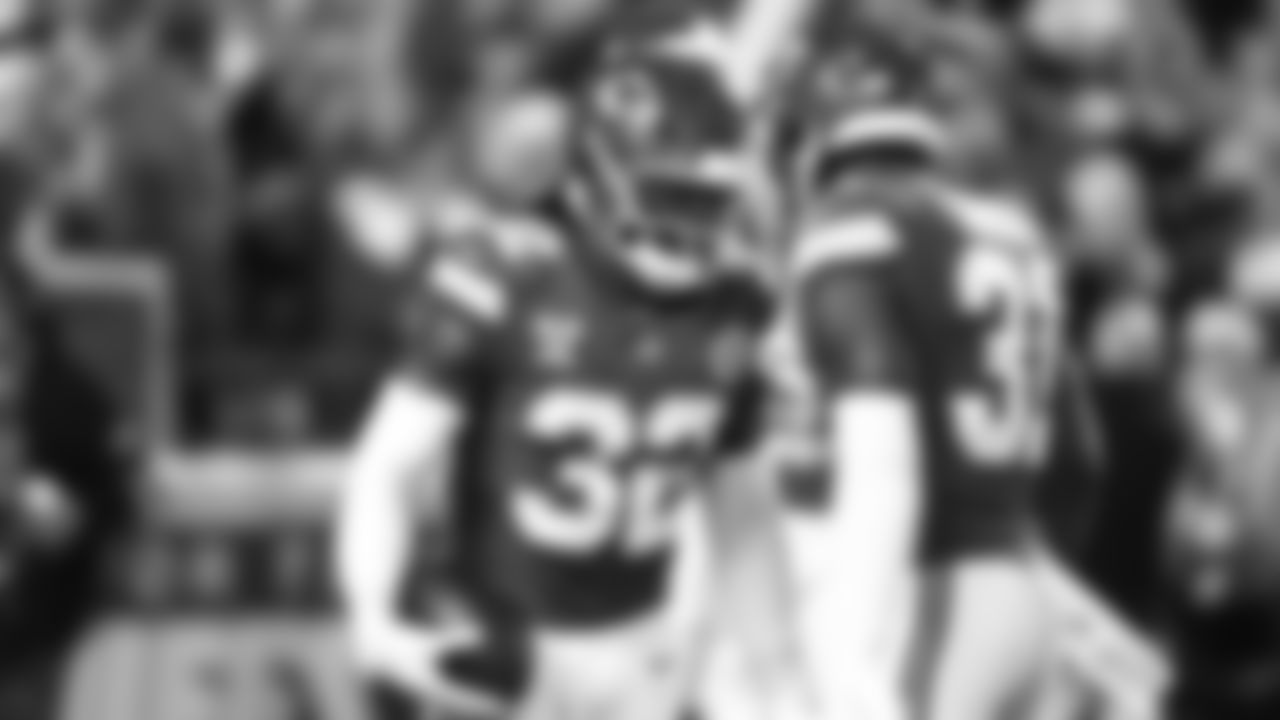 Linebacker Nick Bolton (32) celebrates his interception with Kansas City Chiefs linebacker Jeffrey Bassa (31) during an NFL week 17 matchup against the Denver Broncos, Thursday, December 25, 2025.