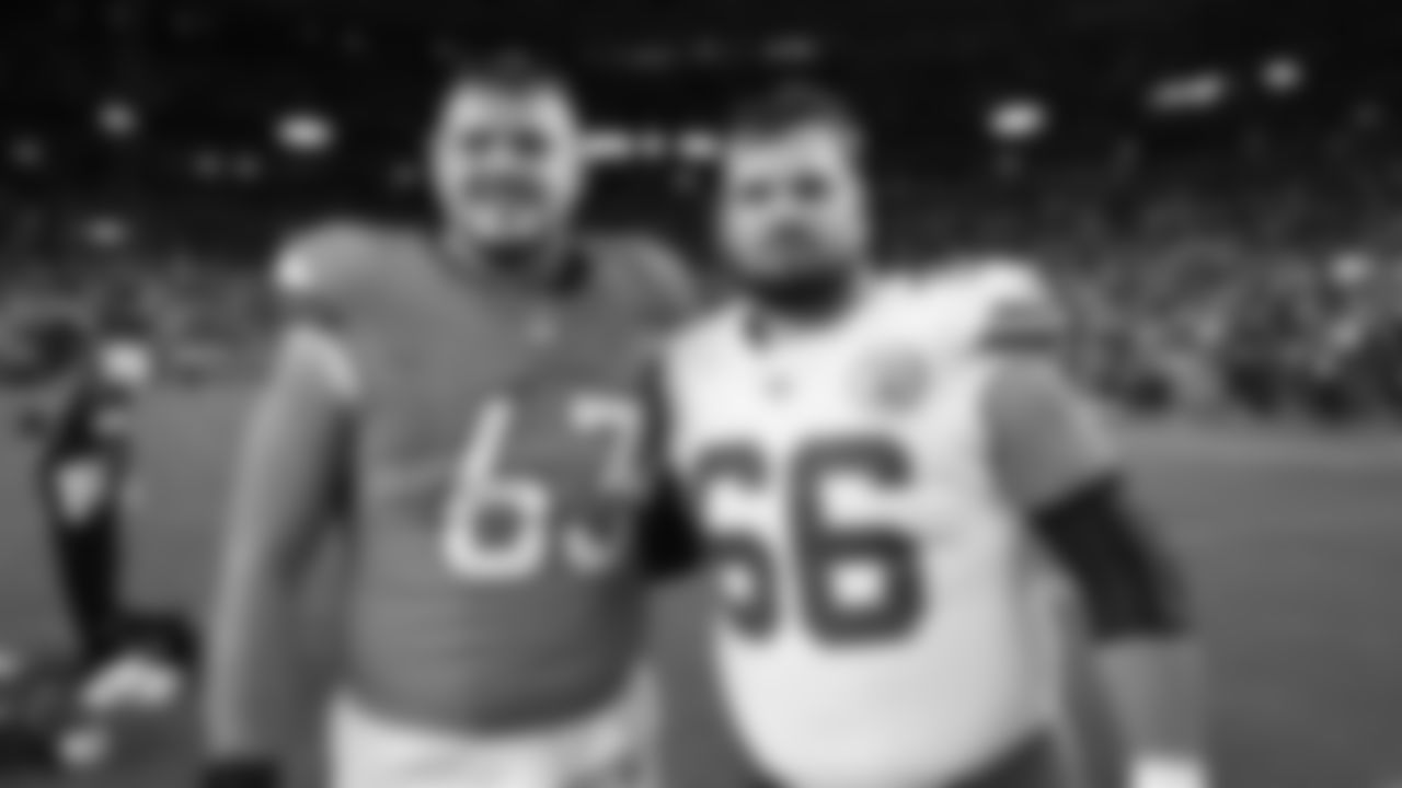 Kansas City Chiefs offensive lineman Michael Caliendo (66) and Broncos tackle Alex Palczewski (63) after a week 11 NFL Football game against the Denver Broncos on Sunday, November 16, 2025 in Denver, Colorado.