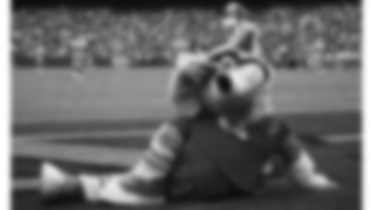KC Wolf poses in the end zone during a 1994 NFL game.