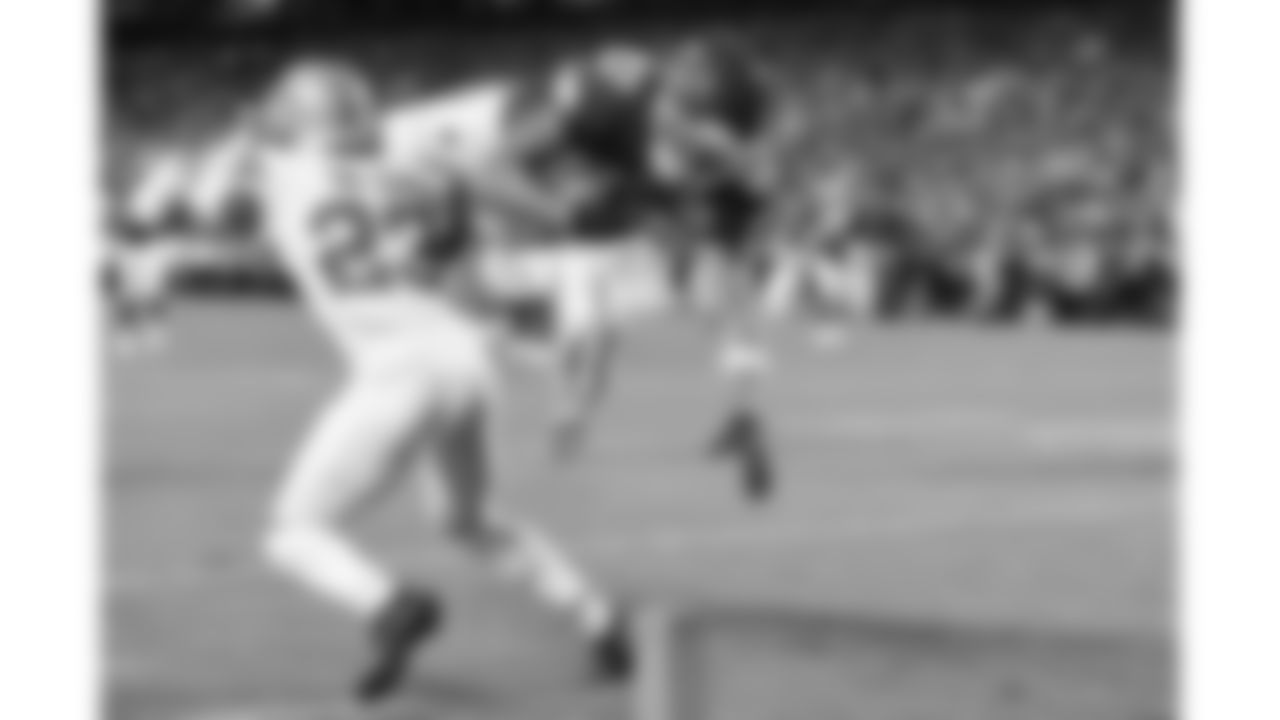 Kansas City Chiefs tight end Travis Kelce (87) gets tackled by Detroit Lions cornerback Rock Ya-Sin (23) while running the ball during the week 6 NFL football game, Sunday, October 12, 2025 in Kansas City, MO.